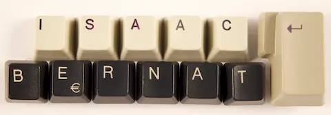 Computer keyboard keycaps spelling out ISAAC and BERNAT in two rows.